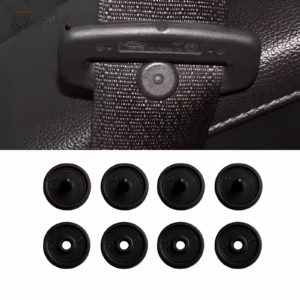 Universal seat belt stoppers on white background – ABS plastic anti-slip buckle retainers